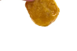 McDonalds Chicken Nugget Dipped In Honey Mustar realistic fake food prop by FakeFood4U
