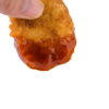 McDonalds Chicken Nugget Dipped In BBQ Sauce realistic fake food prop by FakeFood4U