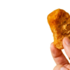 Chicken Nugget Dipped In Sweet N Sour Sauce realistic fake food prop by FakeFood4U