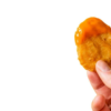 McDonalds Chicken Nugget Dipped In Buffalo Sauc realistic fake food prop by FakeFood4U