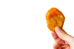 McDonalds Chicken Nugget Dipped In Buffalo Sauc realistic fake food prop by FakeFood4U